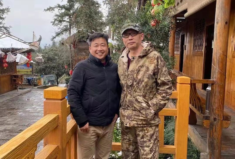 湖南公民程晓峰(右)和709律师谢阳(左)。(程晓峰独家提供,拍摄日期不详)