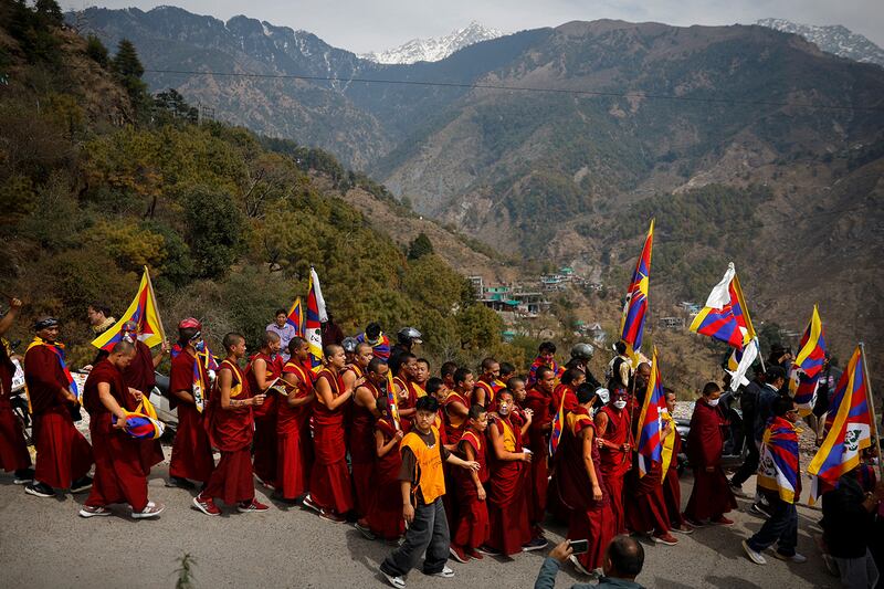 Tibetans participate in a protest march held to mark the 65th anniversary of the Tibetan uprising against Chinese rule, in Dharamsala, India, March 10, 2024.