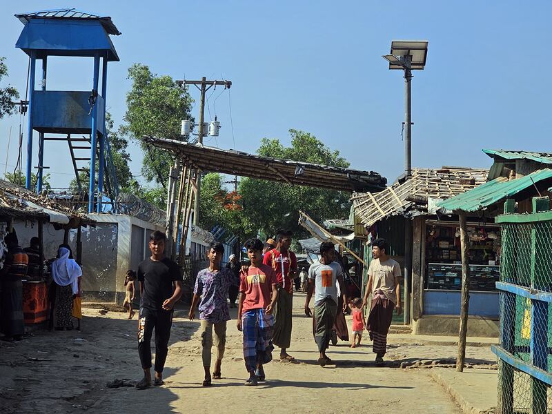 Rohingya teenagers from the Leda camp in Teknaf, a sub-district of Cox’s Bazar, Bangladesh, goes out in search of work, Dec. 20, 2024.