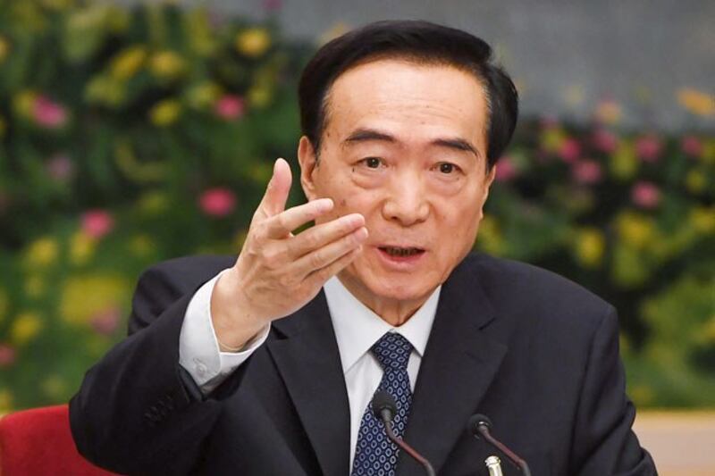 Chen Quanguo, Xinjiang's party secretary, speaks during a meeting of the Xinjiang delegation at the National People's Congress at the Great Hall of the People in Beijing, March 12, 2019. (Greg Baker/AFP)