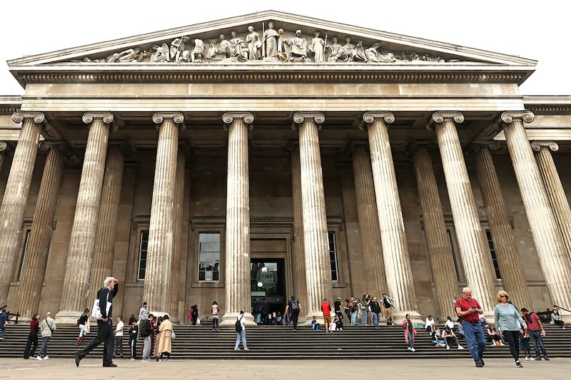 People walk in front of the British Museum in London, England, Sept. 28, 2023.